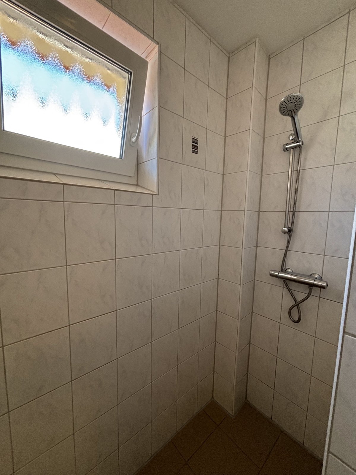 Bodengleiche Dusche mit Fenster